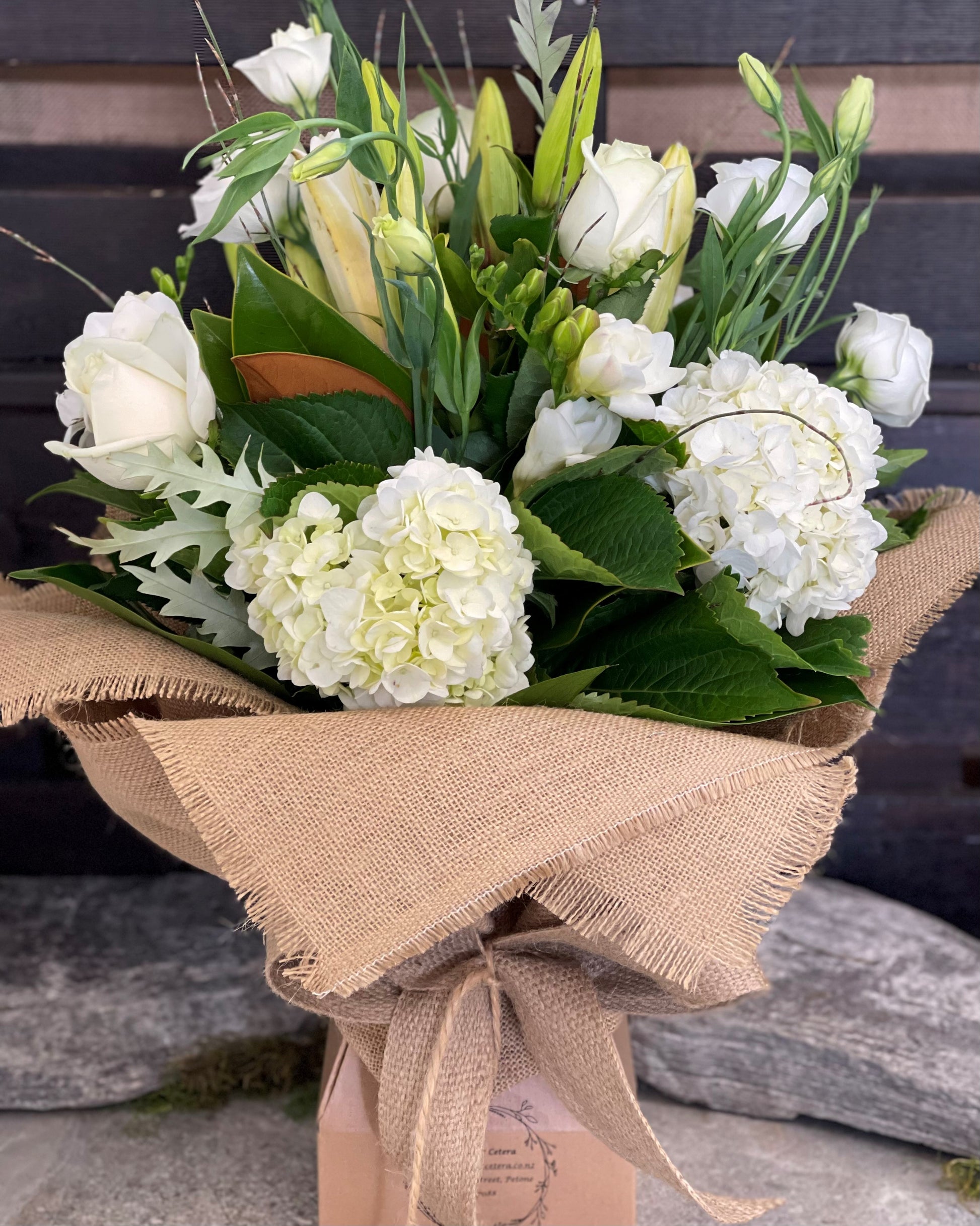 Rustic Radiance A Striking Bouquet in White Flowers et cetera